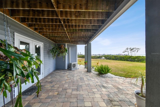 view of patio featuring ac unit