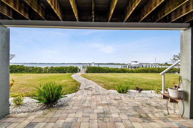 view of patio / terrace featuring a water view