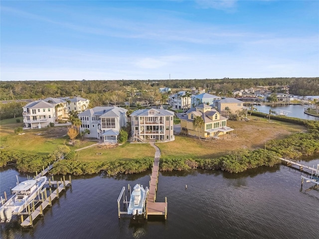 bird's eye view with a water view