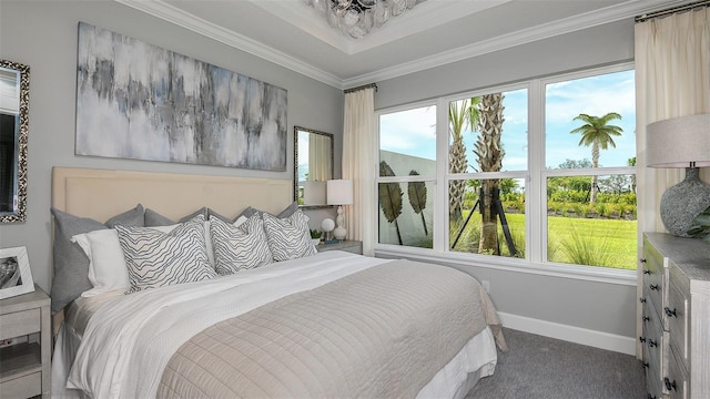 carpeted bedroom with multiple windows and ornamental molding