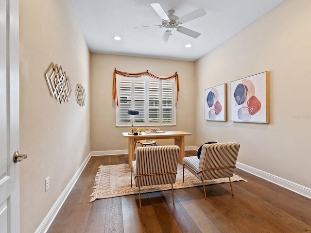 home office with dark hardwood / wood-style floors and ceiling fan