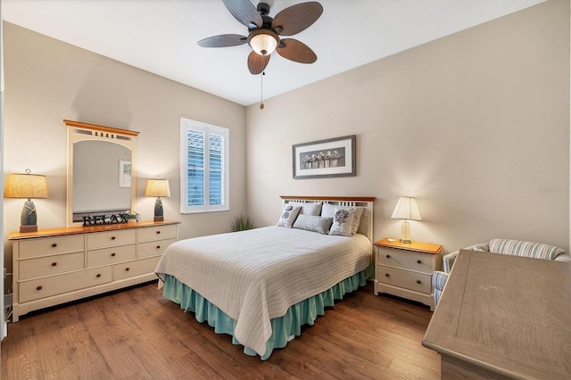 bedroom with wood-type flooring and ceiling fan