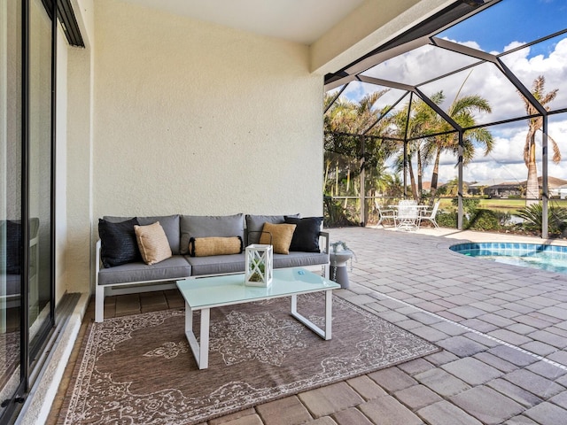 view of patio featuring a lanai