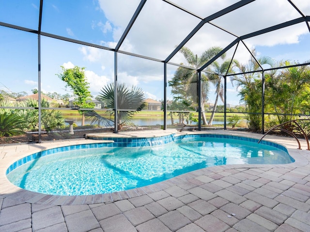 view of pool with a lanai, a water view, and a patio