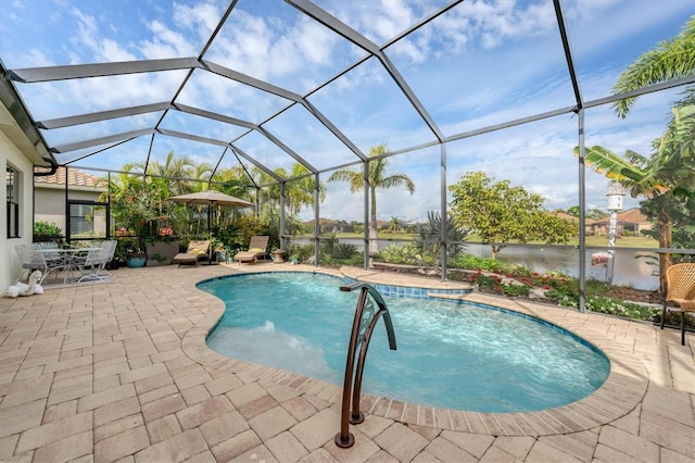 view of pool with a lanai and a patio area