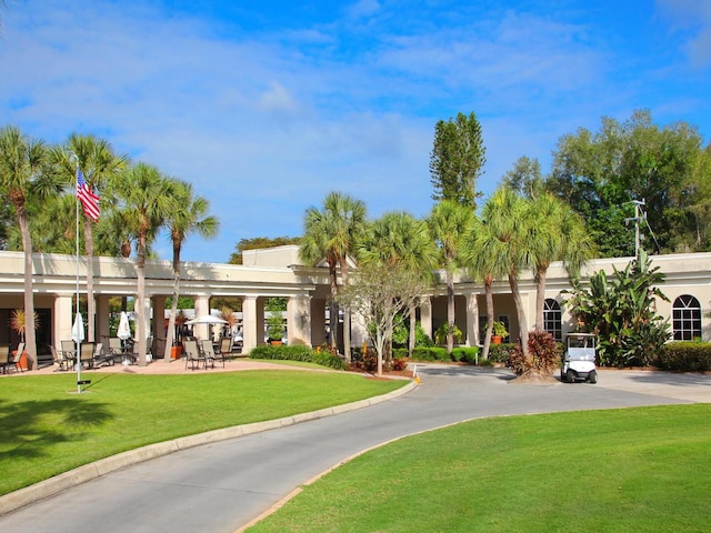 view of community featuring a yard