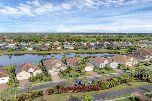 drone / aerial view with a water view