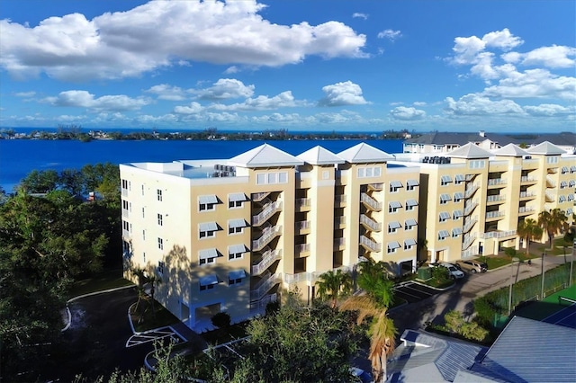 view of property with a water view