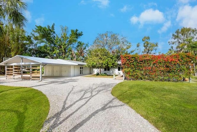 view of property's community featuring a lawn