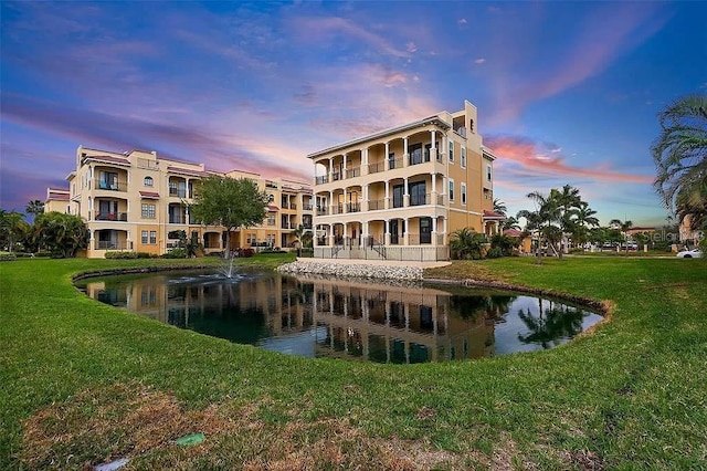 view of outdoor building at dusk