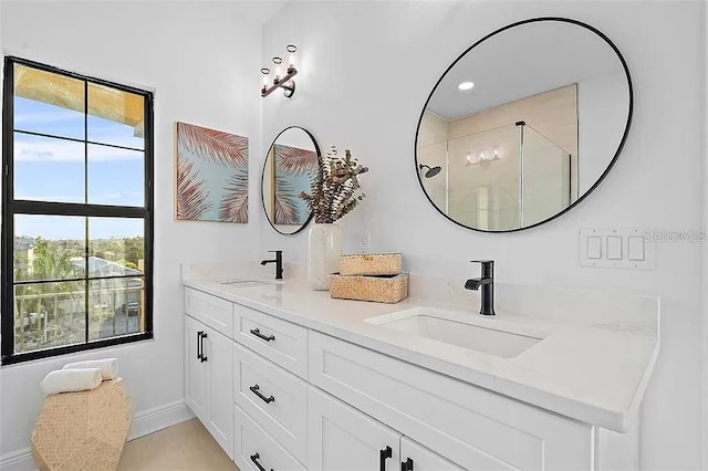 bathroom with vanity and an enclosed shower