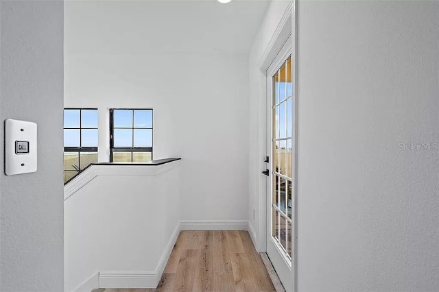 entryway with light hardwood / wood-style floors