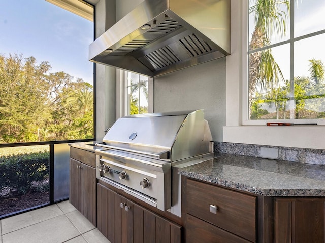 view of patio / terrace featuring area for grilling and an outdoor kitchen