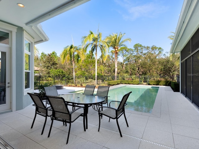 view of patio / terrace featuring a fenced in pool