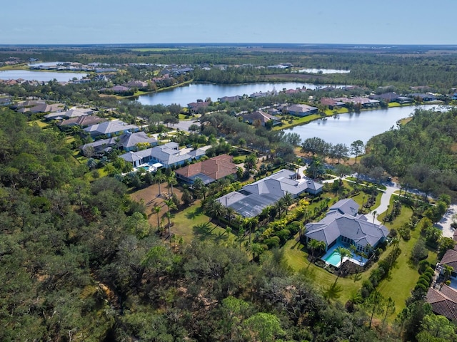 bird's eye view with a water view