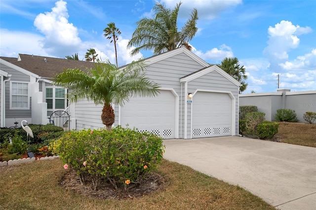 single story home with a garage