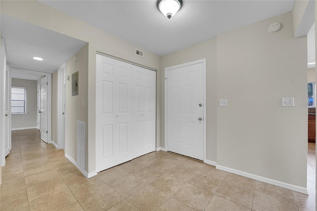 entrance foyer featuring light tile patterned flooring