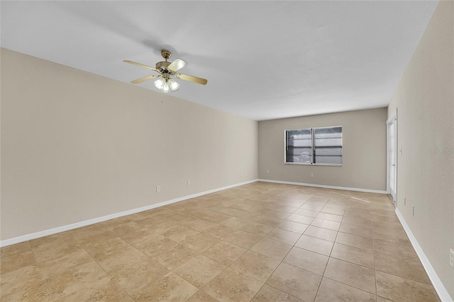 spare room with ceiling fan