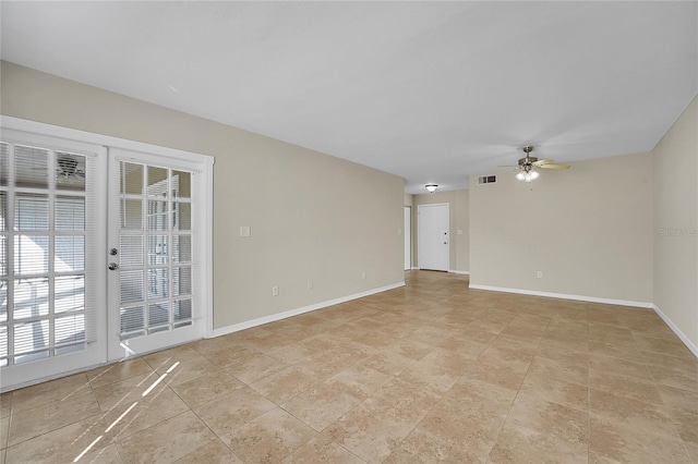 unfurnished room featuring ceiling fan