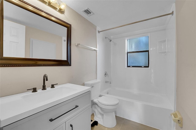 full bathroom with toilet, vanity, tile patterned floors, and tub / shower combination