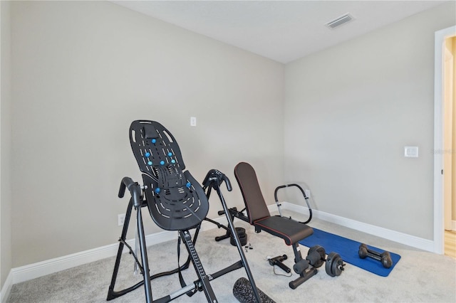 workout area featuring carpet floors