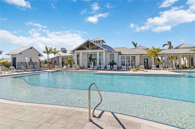 view of pool featuring a patio