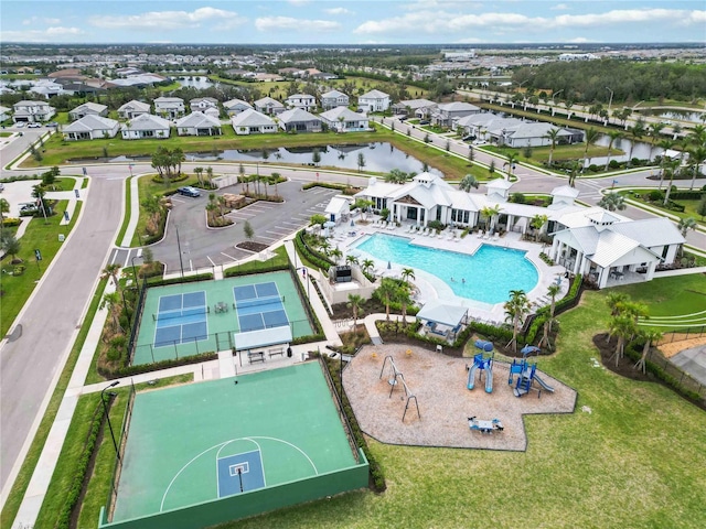 birds eye view of property featuring a water view