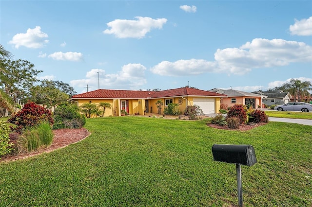 single story home featuring a front lawn and a garage