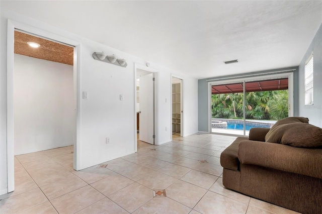 living room featuring light tile patterned flooring