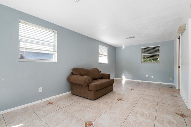 sitting room featuring light tile patterned floors