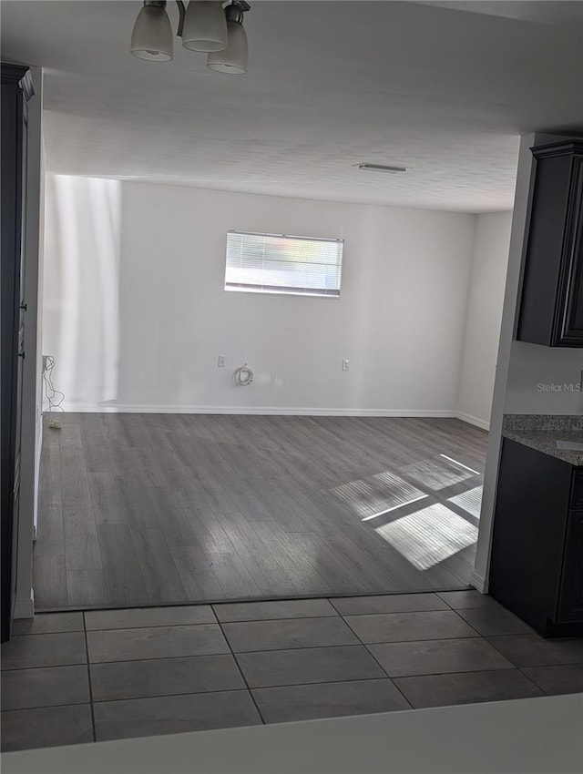 spare room featuring hardwood / wood-style flooring