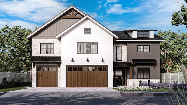 view of front of home with a garage