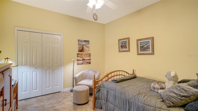 bedroom featuring ceiling fan and a closet