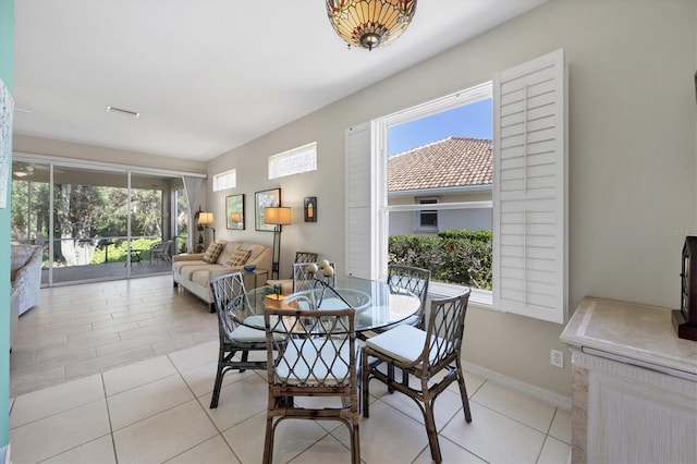 dining space with plenty of natural light