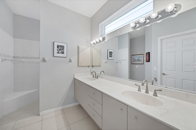 bathroom with tile patterned flooring and vanity