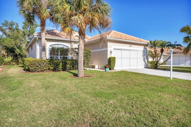 mediterranean / spanish-style house featuring a front yard