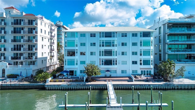 view of building exterior with a water view