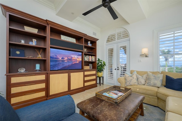 living room featuring ceiling fan, ornamental molding, a wealth of natural light, and french doors