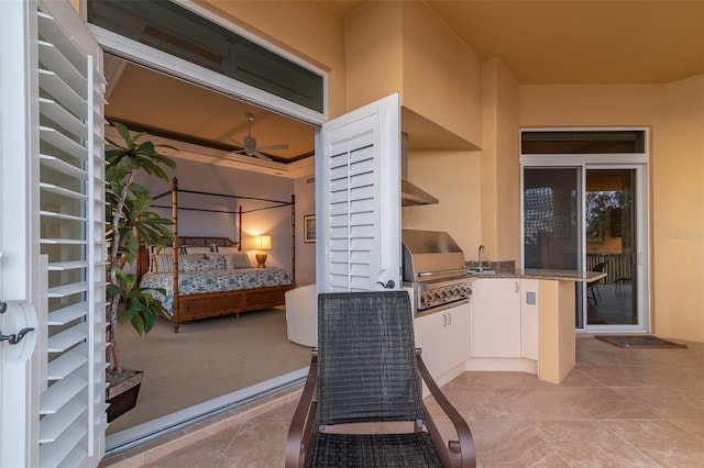 view of patio with an outdoor kitchen and a grill