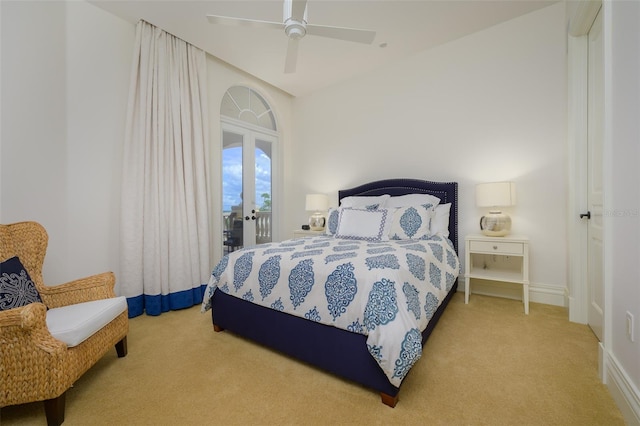 carpeted bedroom featuring ceiling fan and access to outside