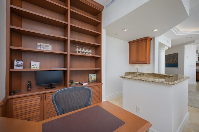 office space featuring built in shelves and light tile patterned flooring