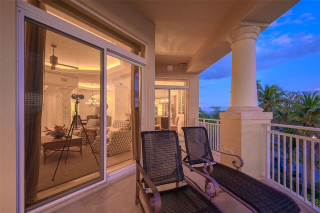 view of balcony at dusk