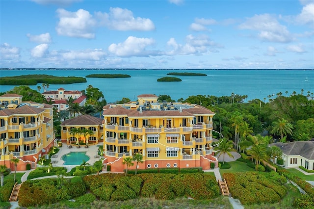 drone / aerial view with a water view