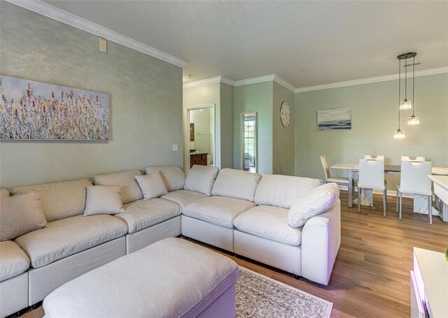1301 Tuscan Ter Unit 9401, Davenport, FL 33896 - living area featuring wood finished floors and ornamental molding