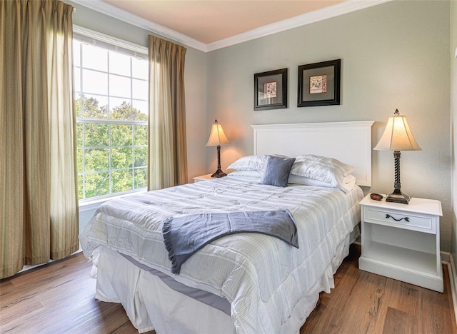 1301 Tuscan Ter Unit 9401, Davenport, FL 33896 - bedroom featuring ornamental molding and wood finished floors