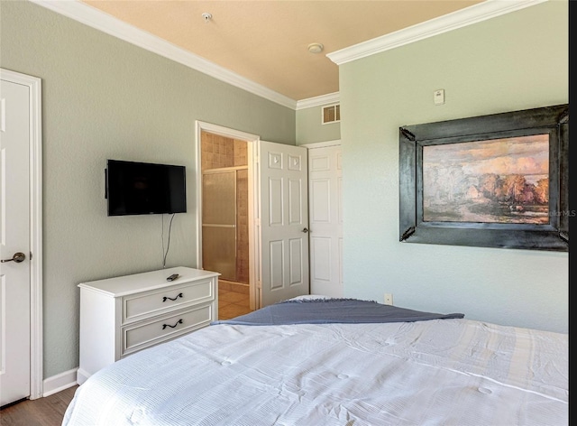 1301 Tuscan Ter Unit 9401, Davenport, FL 33896 - bedroom featuring ornamental molding and dark wood-type flooring