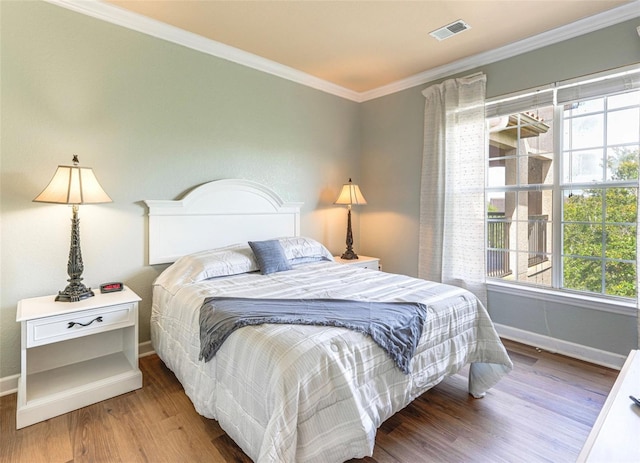 1301 Tuscan Ter Unit 9401, Davenport, FL 33896 - bedroom with wood finished floors and crown molding