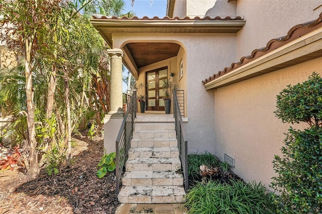 property entrance with french doors