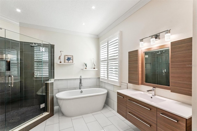 bathroom featuring tile patterned floors, vanity, tile walls, and independent shower and bath