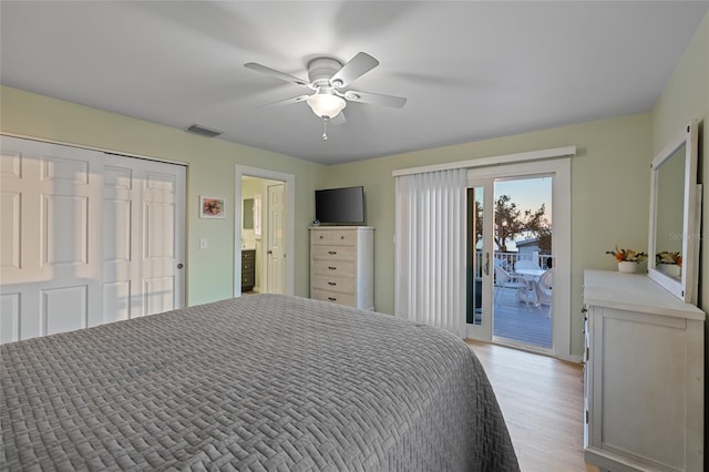 bedroom featuring access to exterior, light hardwood / wood-style flooring, and ceiling fan